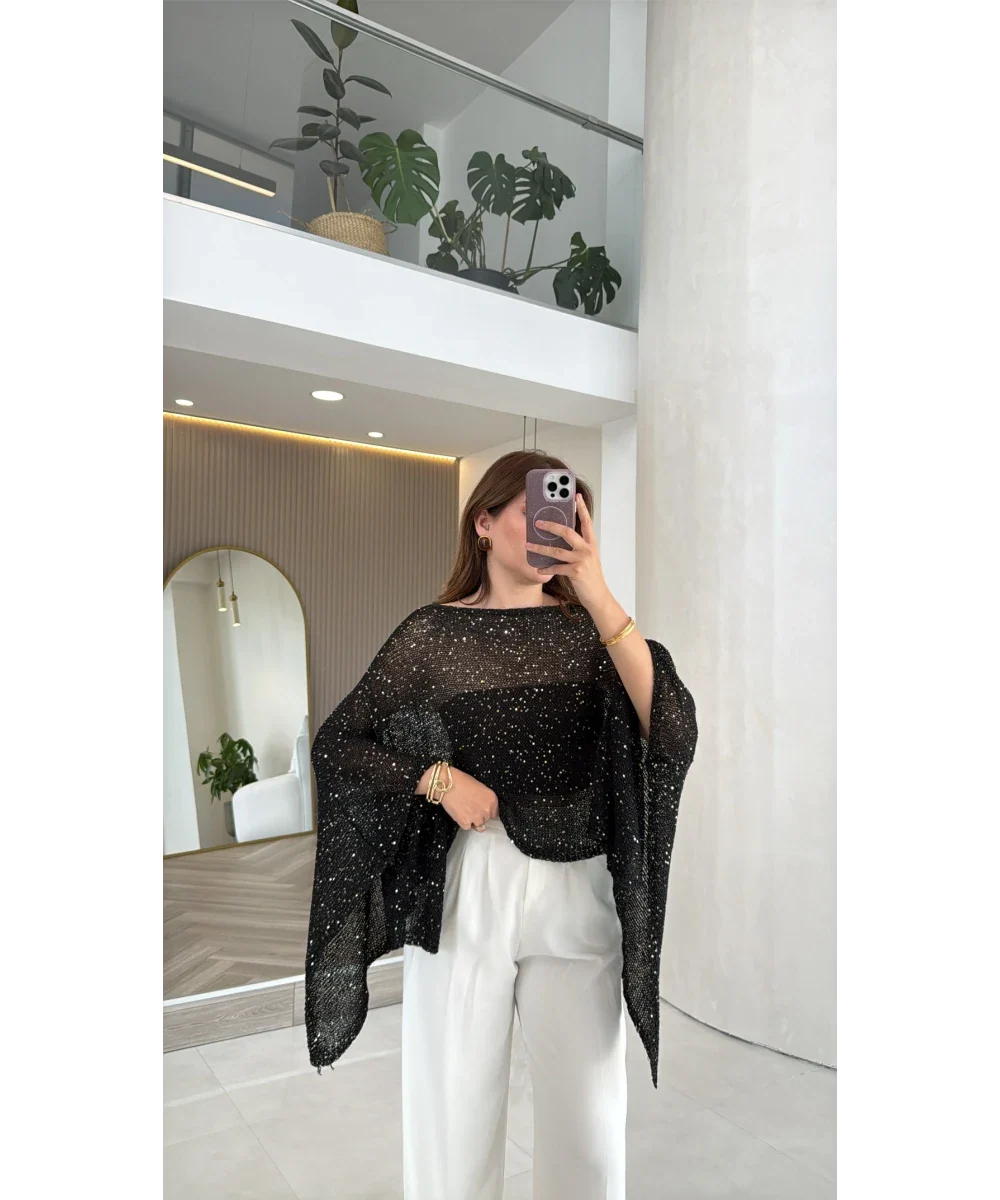 Blusa Capa Eclipse